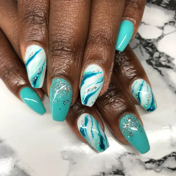 The top turquoise nails and teal nails right now