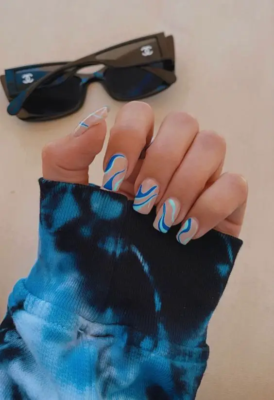 The top blue nails and blue nail ideas including light blue nails, blue acrylic nails, blue nail designs, blue nail art, trendy blue nails, royal blue nails, and short blue nails