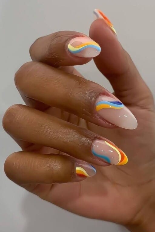 Abstract nail art to inspire your next manicure: Rainbow Swirls