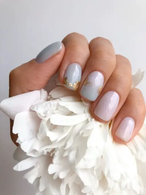 Short nail design ideas for a trendy manicure: Soft Blue & Gold Design