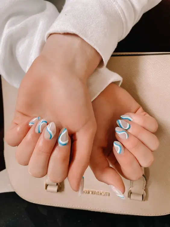 The top blue nails and blue nail ideas including light blue nails, blue acrylic nails, blue nail designs, blue nail art, trendy blue nails, royal blue nails, and short blue nails