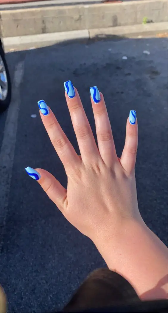 The top blue nails and blue nail ideas including light blue nails, blue acrylic nails, blue nail designs, blue nail art, trendy blue nails, royal blue nails, and short blue nails