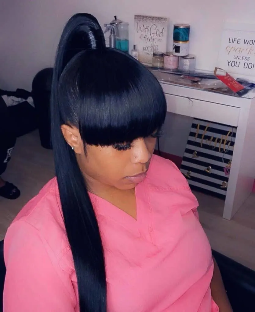 high barbie ponytail with a fringe 