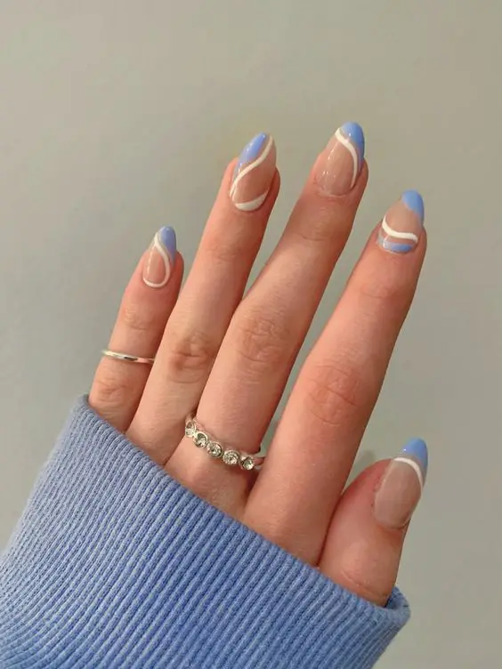 The top blue nails and blue nail ideas including light blue nails, blue acrylic nails, blue nail designs, blue nail art, trendy blue nails, royal blue nails, and short blue nails