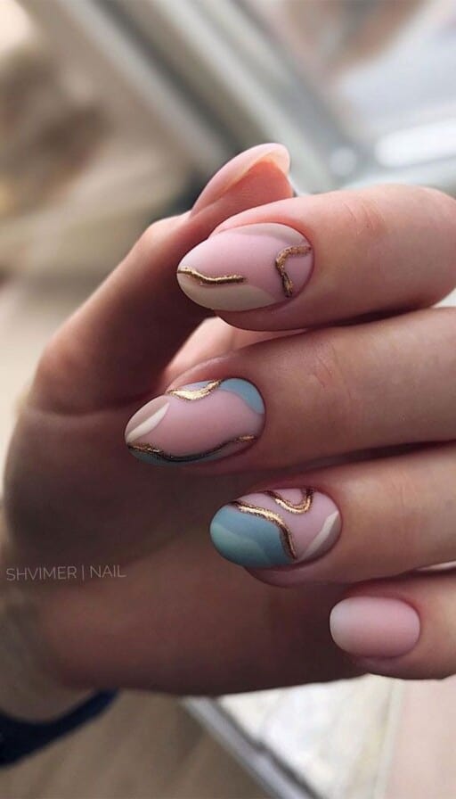 Abstract nail art to inspire your next manicure: Pink, Blue, & Gold