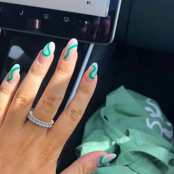 The top turquoise nails and teal nails right now