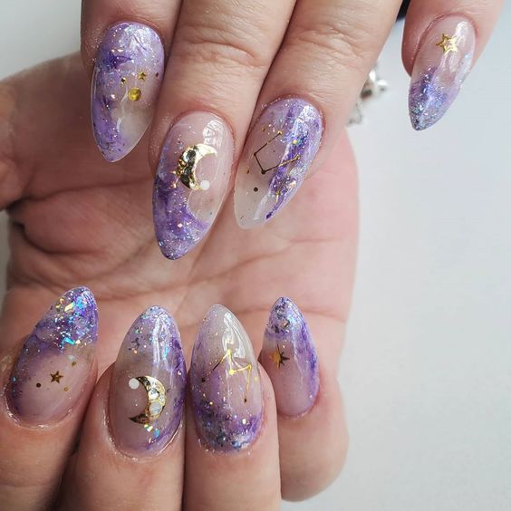 Galaxy nails, galaxy nail designs, and galaxy nail art for a gorgeous manicure