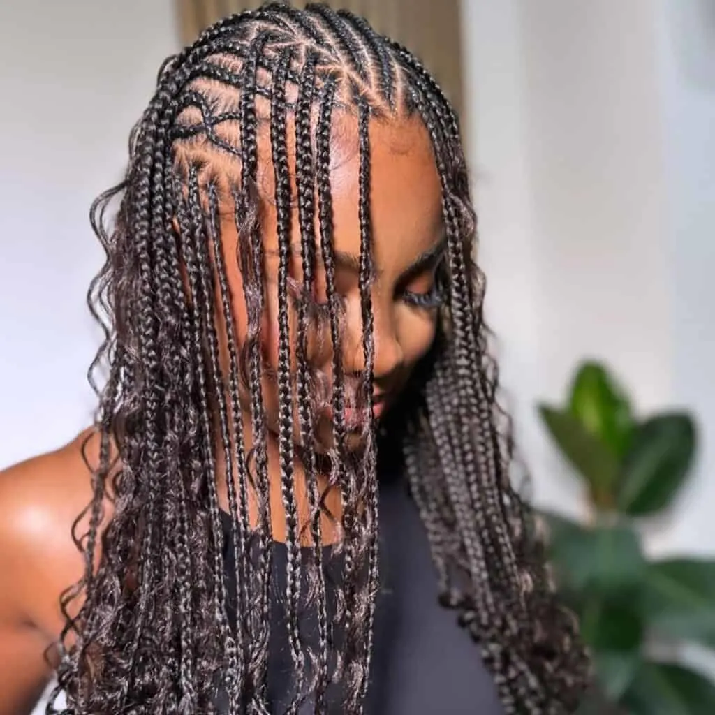 short bohemian flip over Fulani braids.