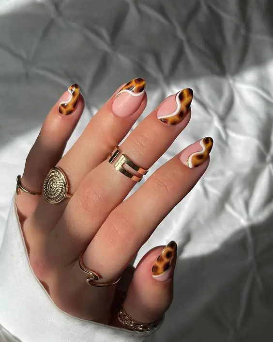 The top leopard nails, leopard print nails, cheetah print nails, cheetah nails, and animal print nails in general