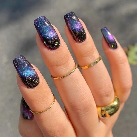 Galaxy nails, galaxy nail designs, and galaxy nail art for a gorgeous manicure