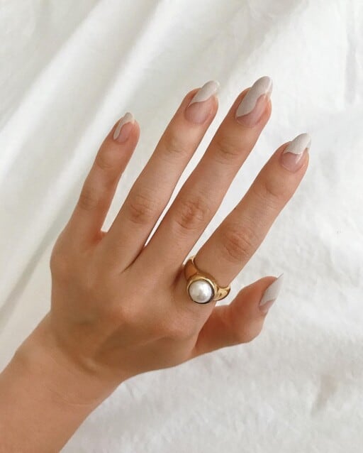 Abstract nail art to inspire your next manicure: Neutral With White Swirls