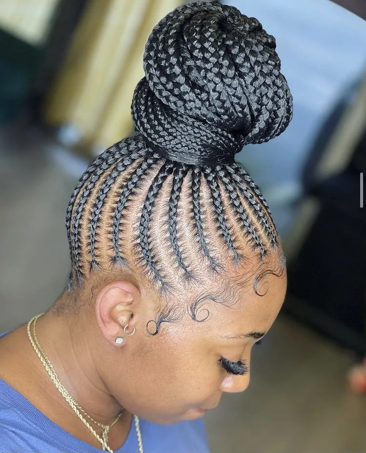 small stitch braids in a bun