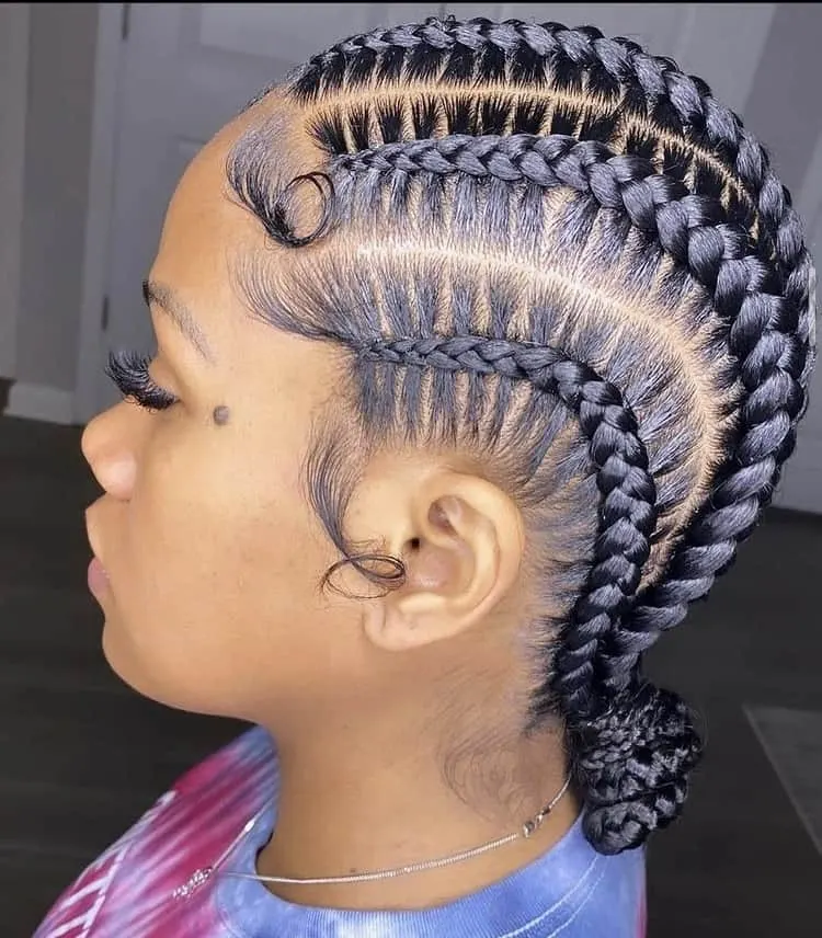 large stitch cornrow braids in 2 buns