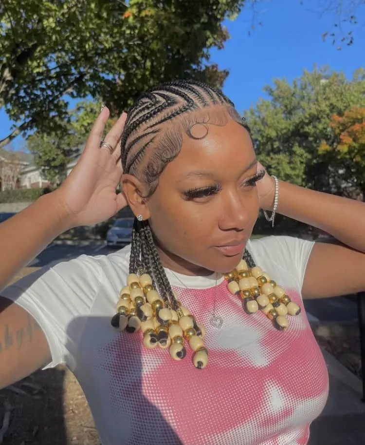 short Alicia keys inspired braids with beads