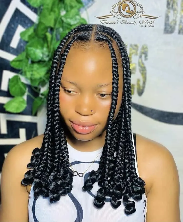 short black Coi Leray braids