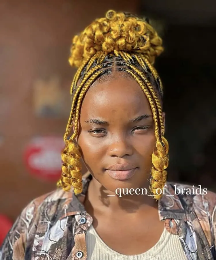 yellow Coi Leray braids