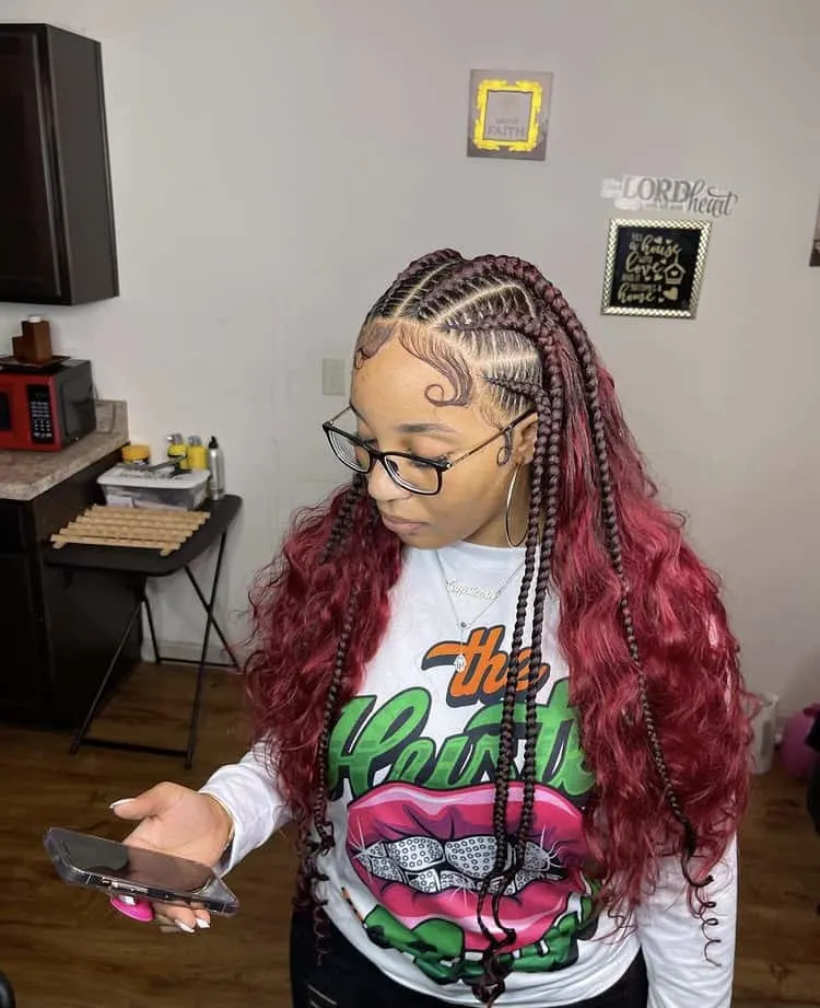 red feed in stitch braids with curly hair at the back