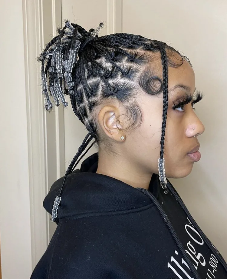 short knotless braids with beads on natural hair 