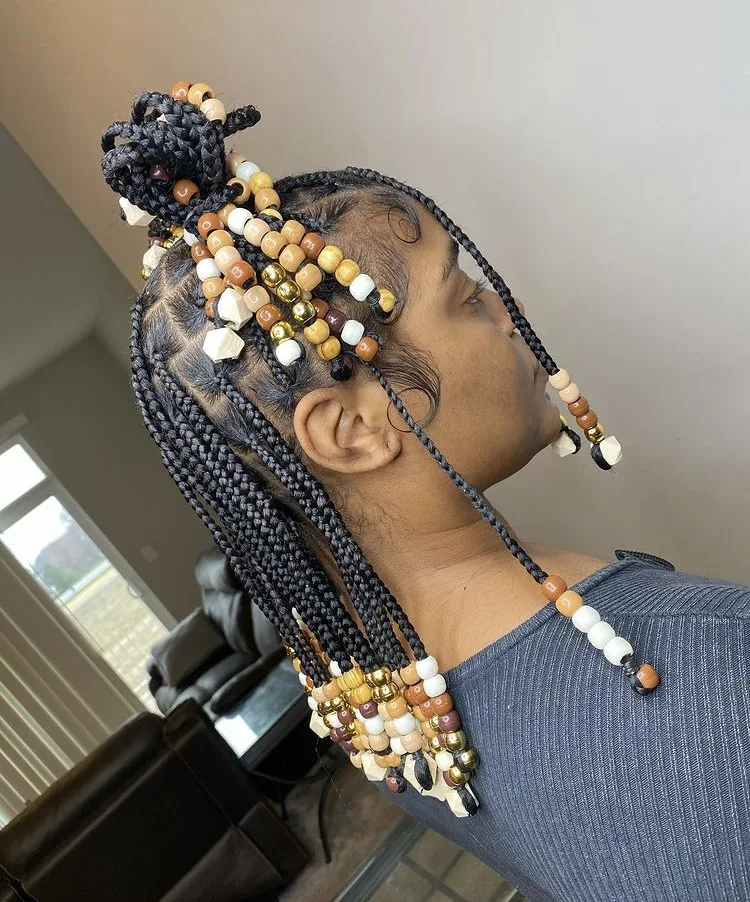 short knotless braids with beads on natural hair 