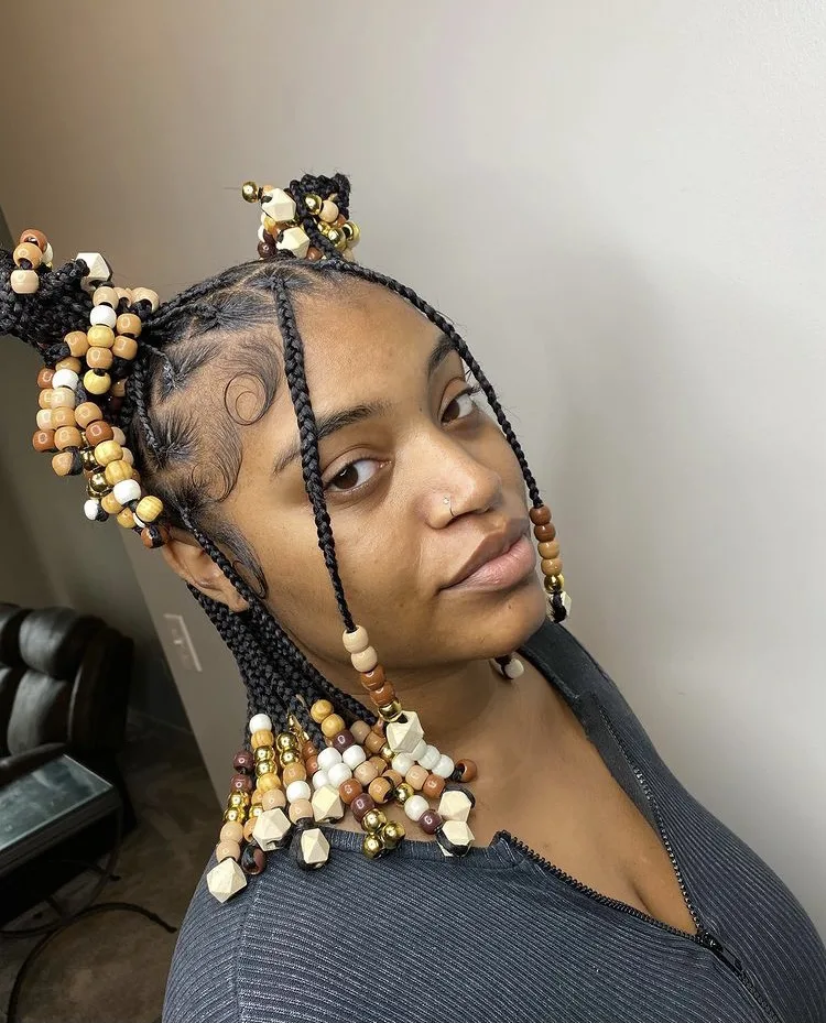 short knotless braids with beads on natural hair 