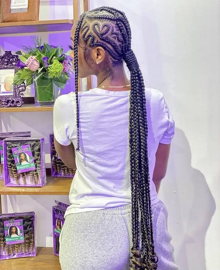 stitch cornrow braids with a heart design and curly ends