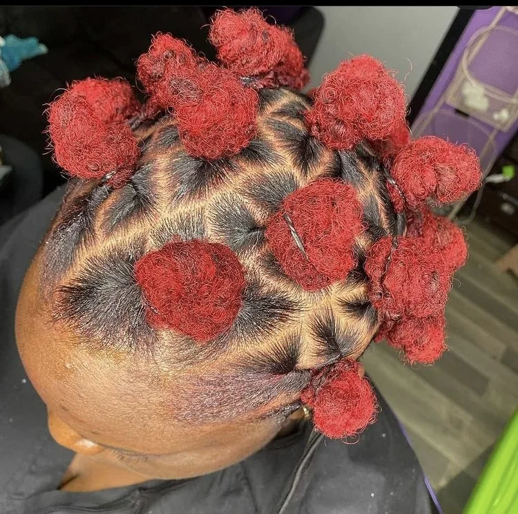 bantu knots on short red dreadlocks