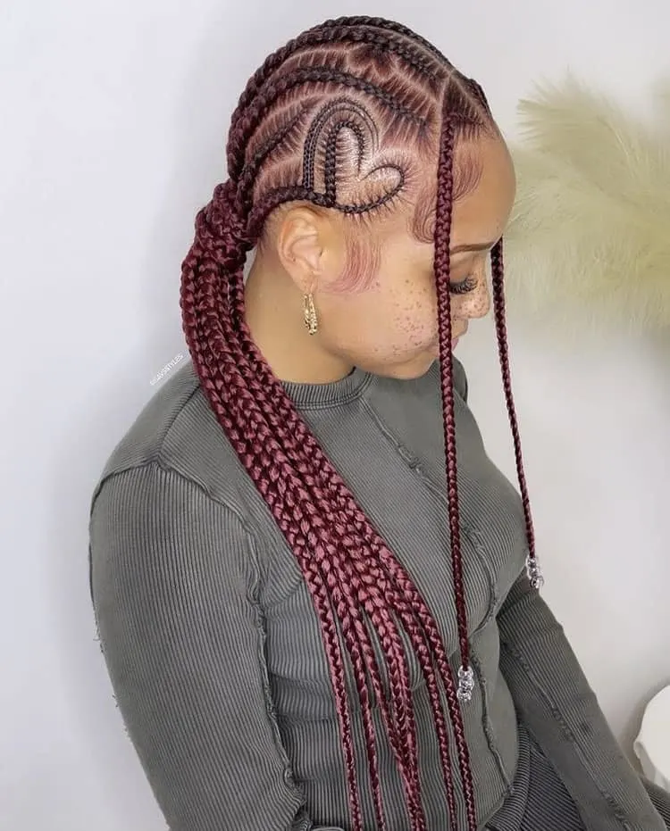 burgundy stitch cornrow braids with a heart