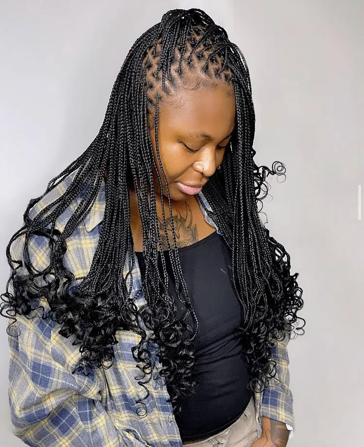 small knotless braids with curly ends 