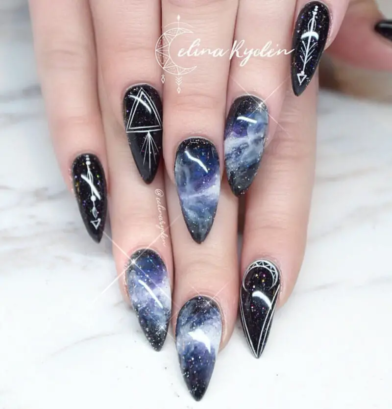 Galaxy nails, galaxy nail designs, and galaxy nail art for a gorgeous manicure