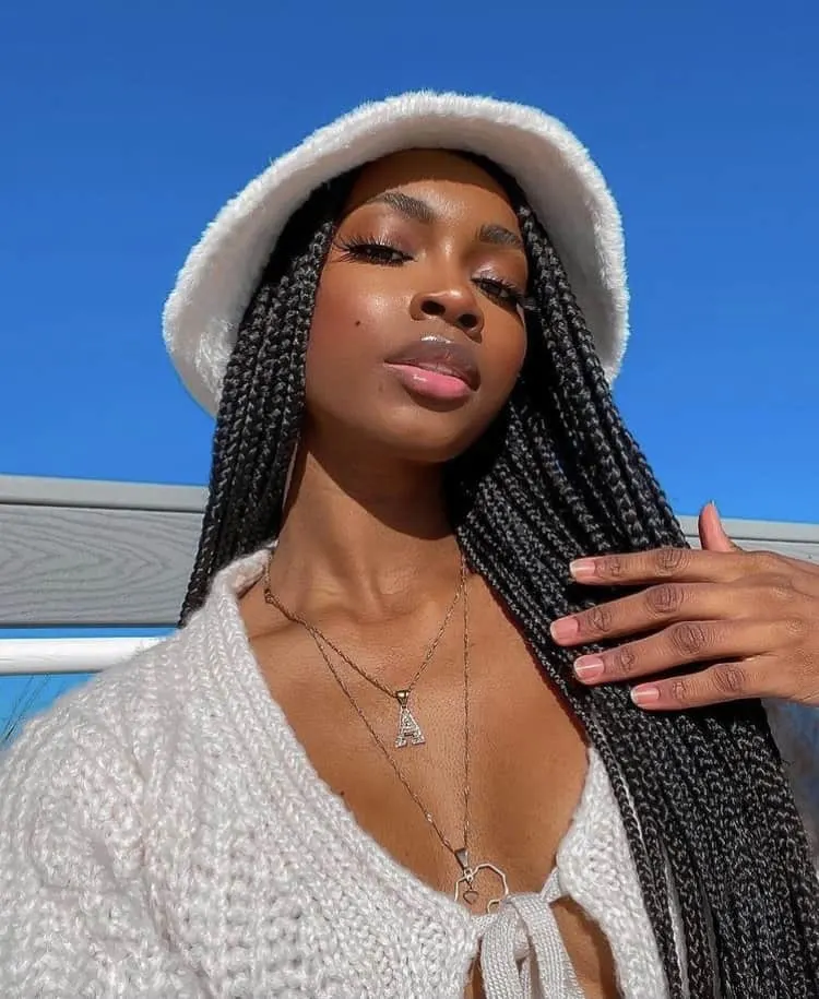 box braids with a bucket hat