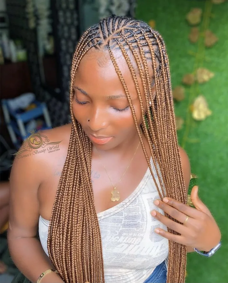 brown flip over Fulani braids