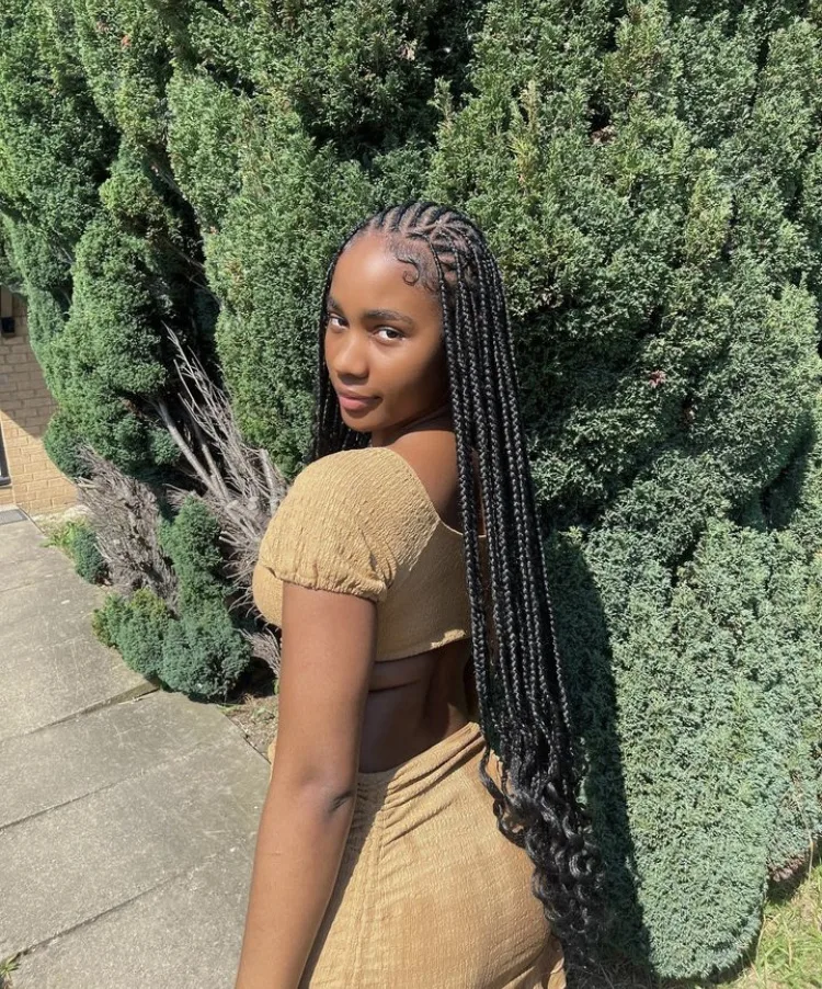 long flip over fulani braids with curly ends 