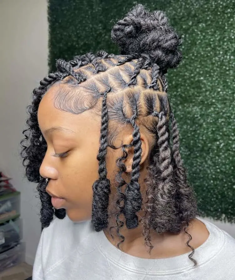 boho bob invisible locs in a side swoop and bun