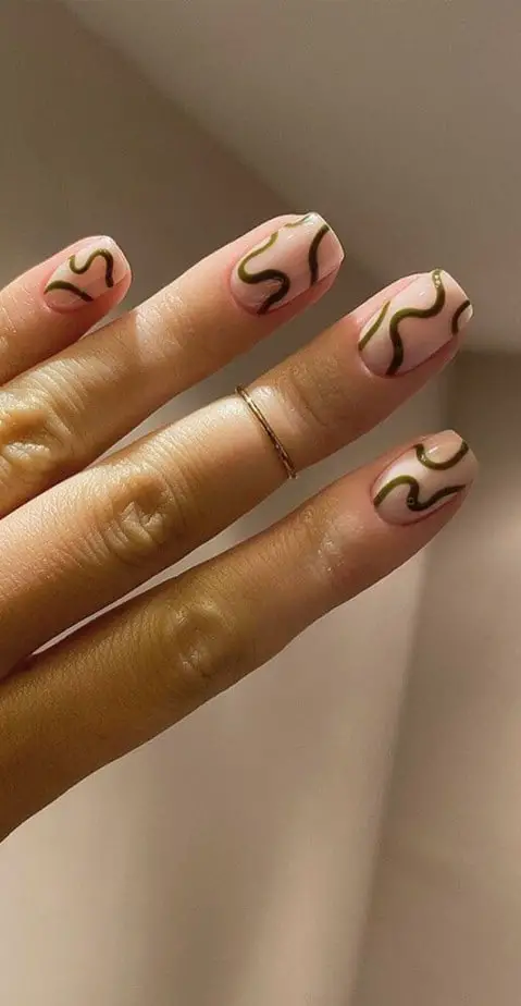 Abstract nail art to inspire your next manicure: Thin Olive Green Swirls