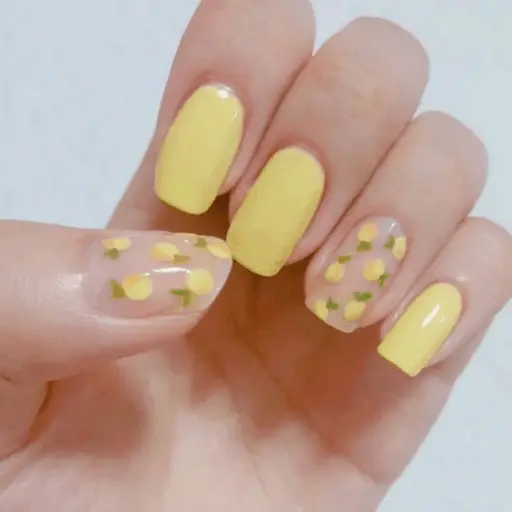 Trendy yellow nail designs for a sunny manicure: Fruit Accent