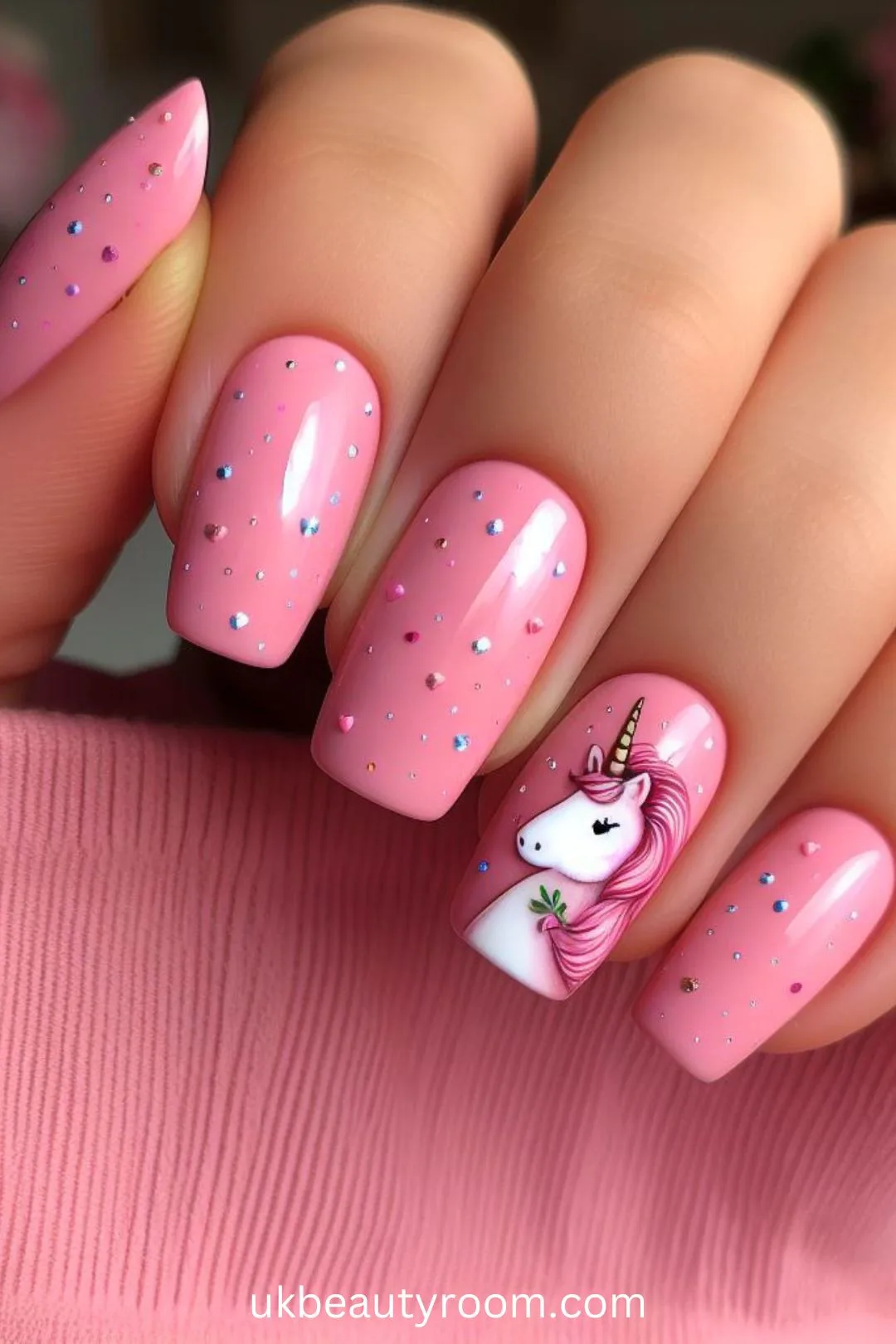 Pink nail ideas with a Tiny Unicorn Decal