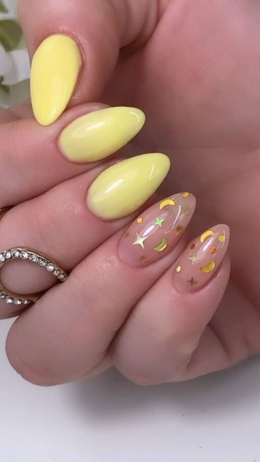 Trendy yellow nail designs for a sunny manicure: Star & Moon Accents