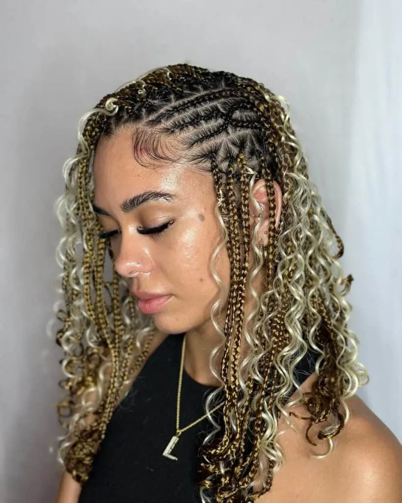 short blonde bohemian flip over Fulani braids