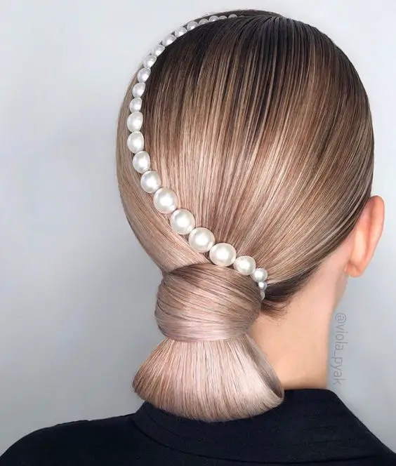 The top low bun hairstyles including low bun wedding hair, easy low bun hairstyles, and low bun hairstyles for long hair