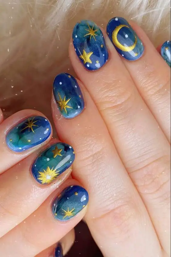 Galaxy nails, galaxy nail designs, and galaxy nail art for a gorgeous manicure