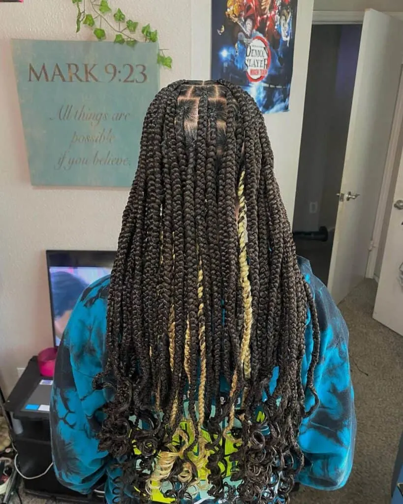 blonde peekaboo knotless braids with curled ends