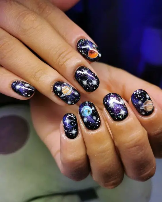 Galaxy nails, galaxy nail designs, and galaxy nail art for a gorgeous manicure