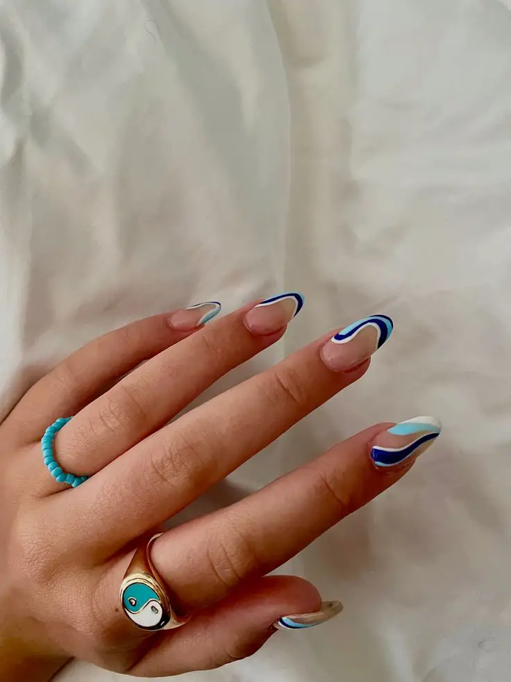 The top blue nails and blue nail ideas including light blue nails, blue acrylic nails, blue nail designs, blue nail art, trendy blue nails, royal blue nails, and short blue nails