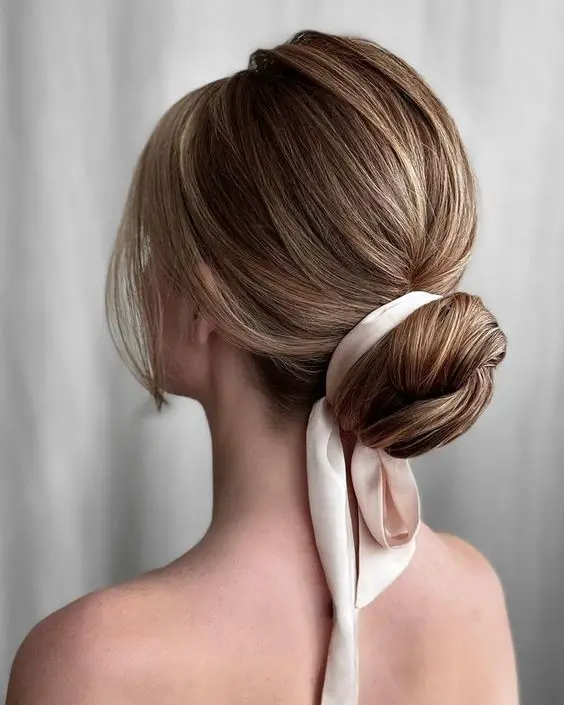 The top low bun hairstyles including low bun wedding hair, easy low bun hairstyles, and low bun hairstyles for long hair