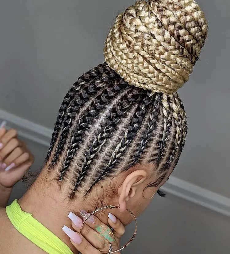 blonde stitch braids in a bun