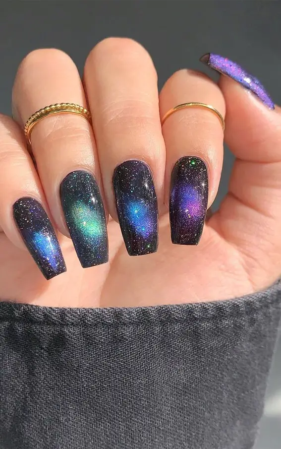 Galaxy nails, galaxy nail designs, and galaxy nail art for a gorgeous manicure