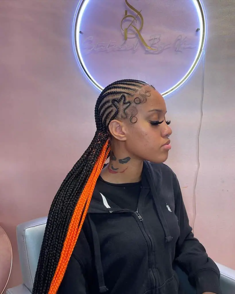 Peekaboo stitch cornrows with star design